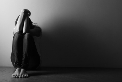 Teenager,Girl,With,Depression,Sitting,Alone,On,The,Floor,In